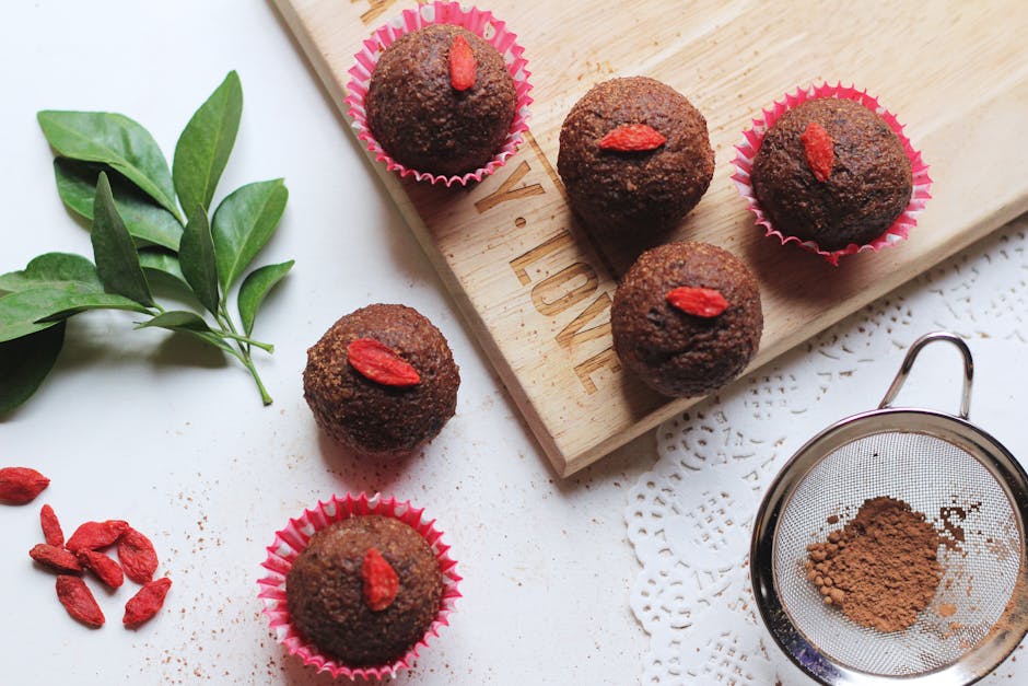 Tasty chocolate cupcakes topped with goji berries, perfect for a sweet treat